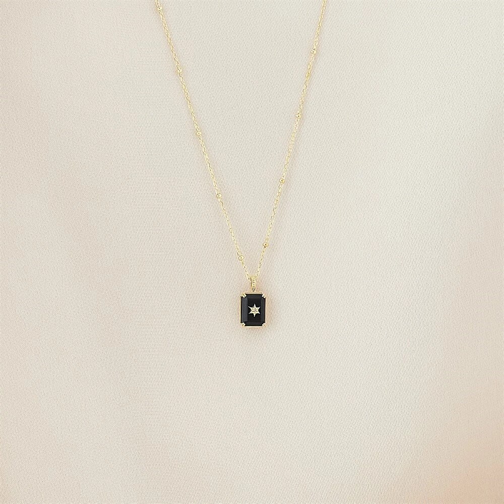 夢へ導く希望の道標「星」 K10イエローゴールドブラックカルセドニーホワイトトパーズチャームイメージ