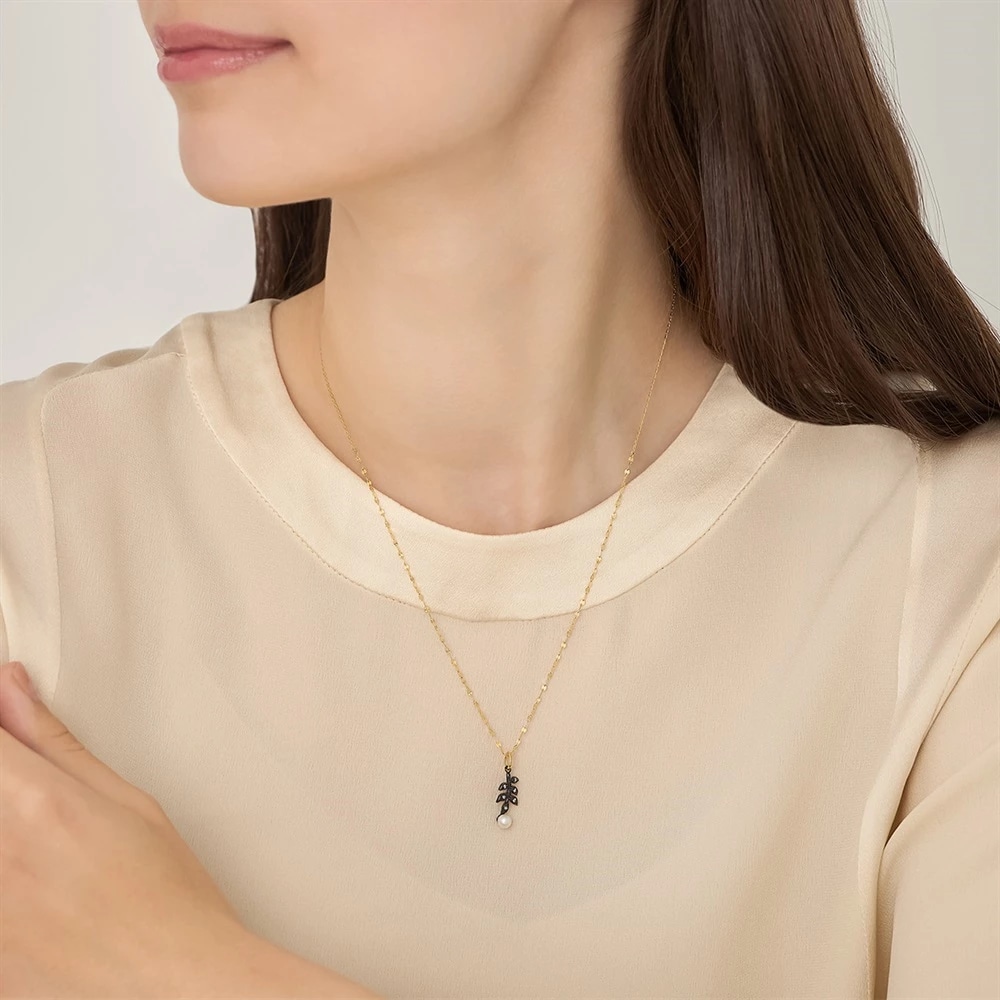 K10イエローゴールド/シルバーダイヤモンドパールチャーム 着用イメージ